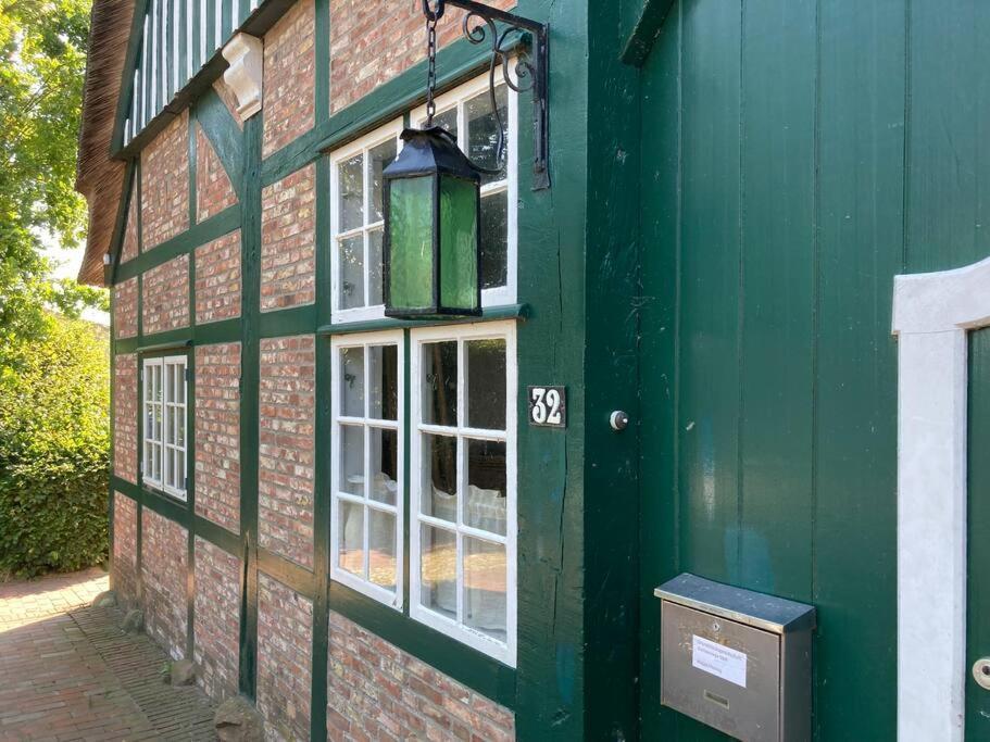 Idylle Unter Reet, Gemuetliche Ferienwohnug Apartment Haseldorf Exterior photo